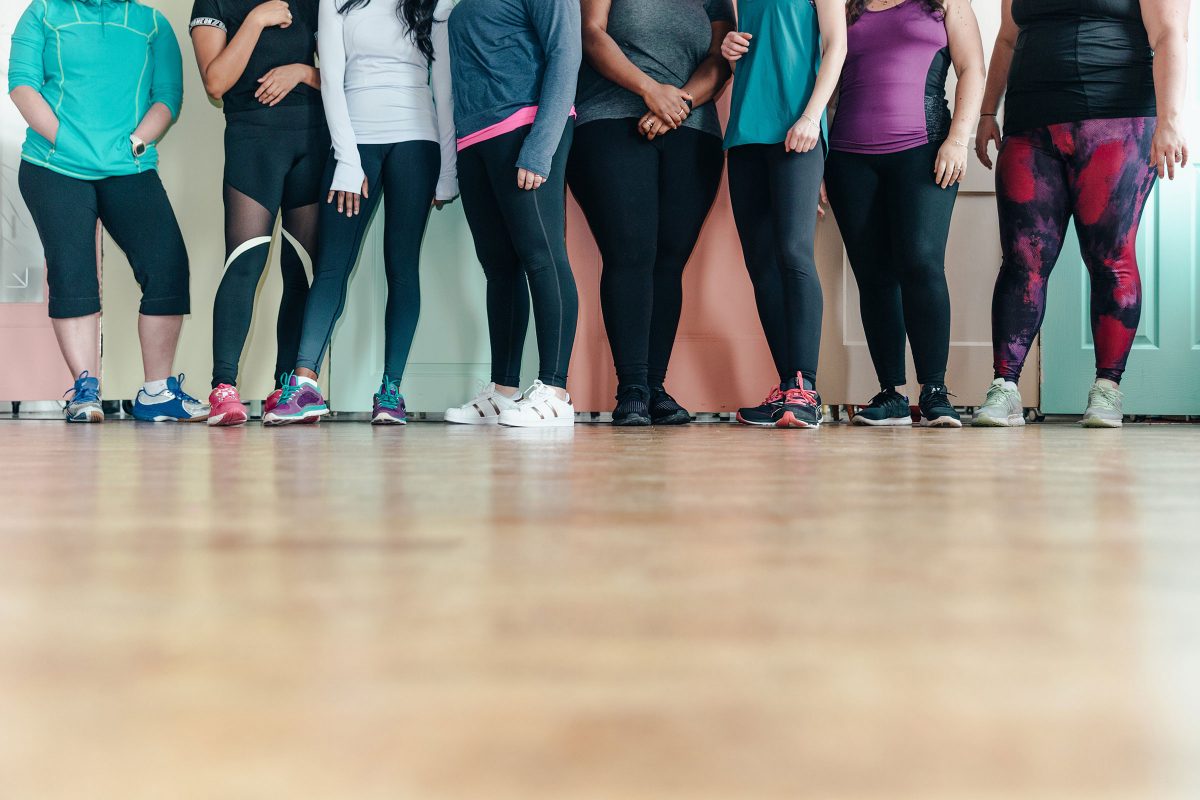 legs of women in leggings in a gym